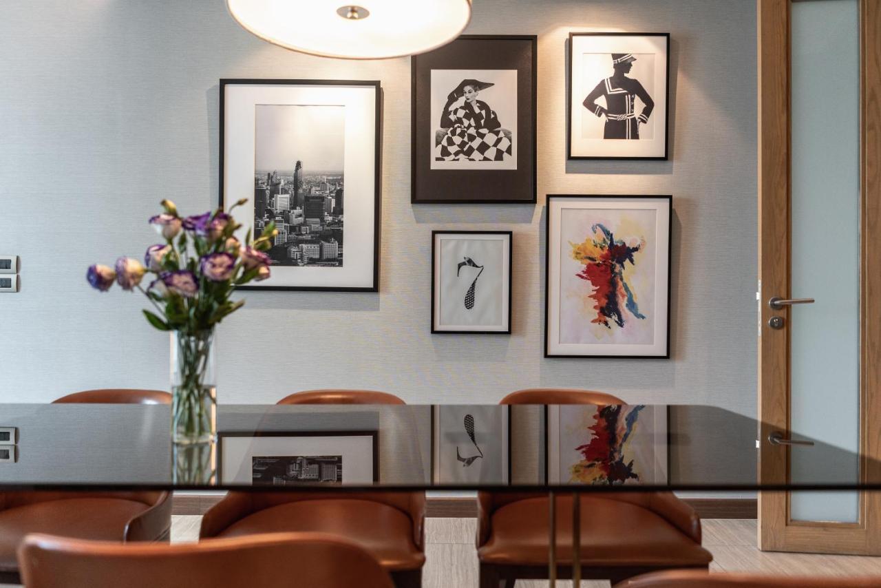 Muu Bangkok, Small Luxury Hotels Of The World Exterior foto A collection of prints by various artists