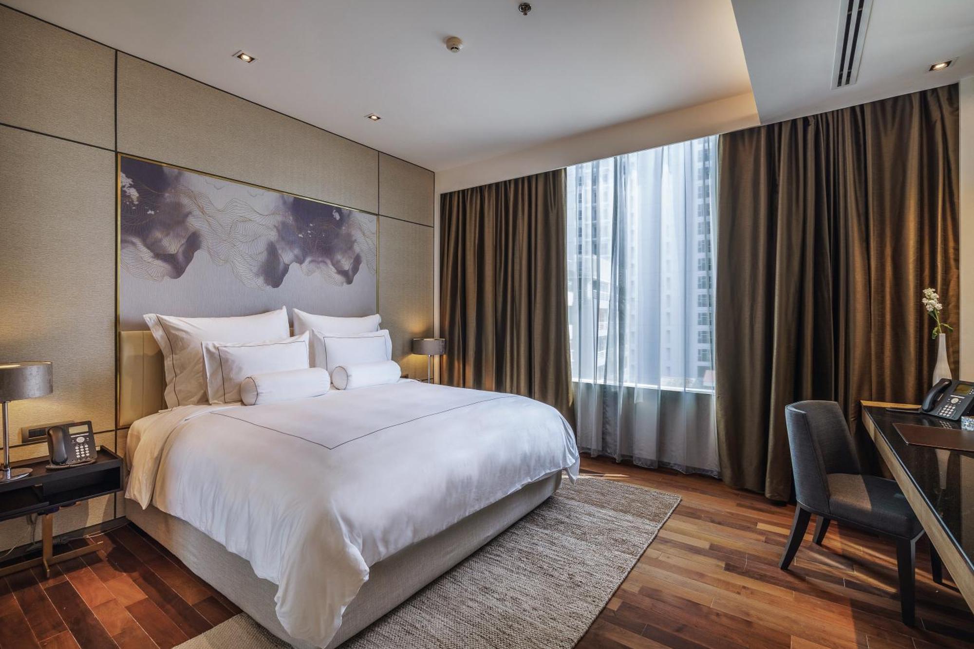 Muu Bangkok, Small Luxury Hotels Of The World Exterior foto A bedroom at The Hari